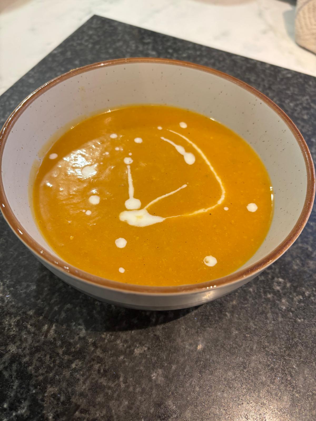 Seasonal vegetable soup in a ceramic bowl